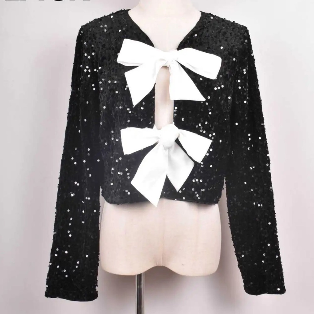 FROM PARIS FRANCE Elegant Black Sequin Jacket with White Bows